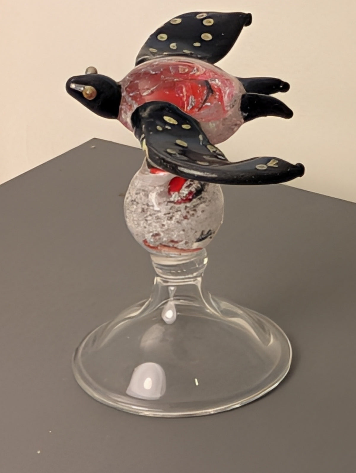 Angled view of red and black turtle Glass Everlasting Legacy Goblet sculptural memorial